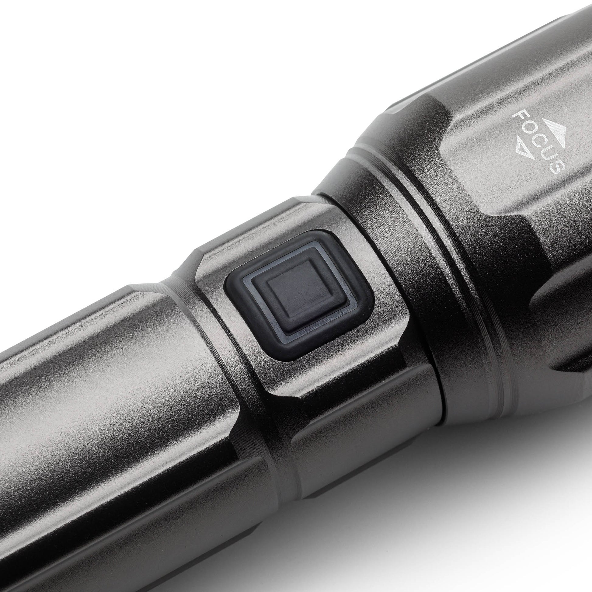 Power button on the side of handheld flashlight