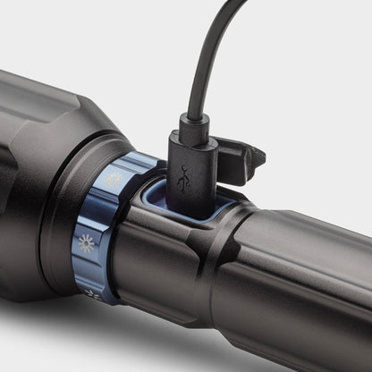 Dark gray CORE 3000 lumen rechargeable flashlights charging port with USB C cable. 